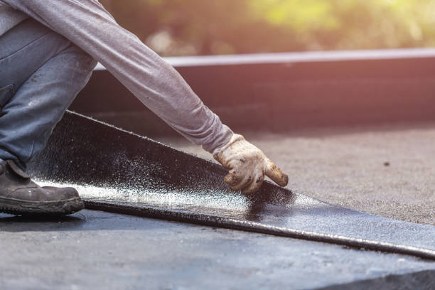 Professional Waterproofing technician working in Mayville, NY